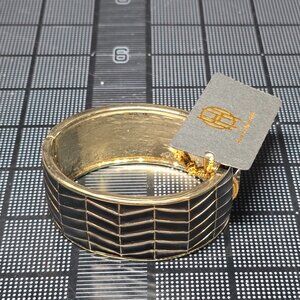 House of Harlow River Bracelet gold tone cuff bracelet black geometric design
